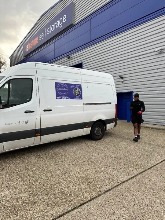 Long-distance moves — van at self storage 6 Days Logistics branded removals van at a Safestore self-storage facility for long-distance move collection and storage handoffs